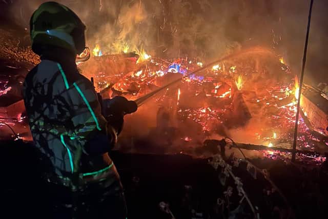Fire crews tackle late night chalet blaze behind pub