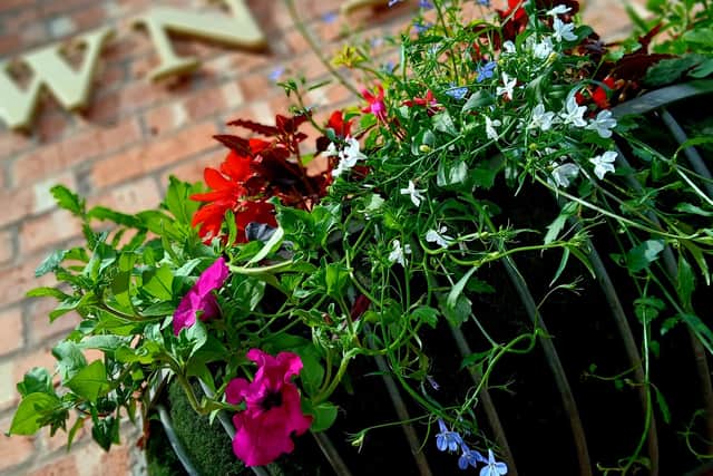 The town council provides 77 baskets, 29 mangers and 35 pole tops throughout the town. Picture: Market Drayton Town Council.