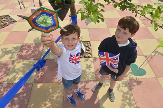  Corbett Primary School, where they have had a special day of events marking the official opening of there new garden.   Edward 8 and Harley-Bear 8.