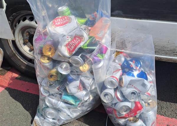 141 empty cans of lager and cider were found inside the van. Picture: West Mercia Police