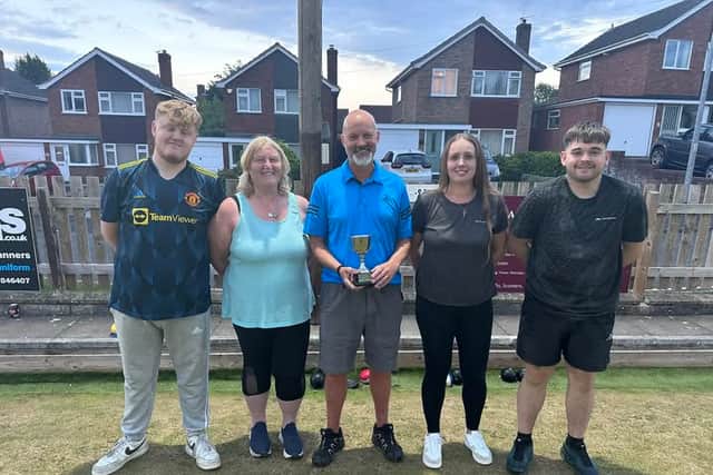 Smiling finalists (from left) Tom Killen, Angela Boot, a representative of the sponsors, and winners Emma Duncan and Nathan Lacey 