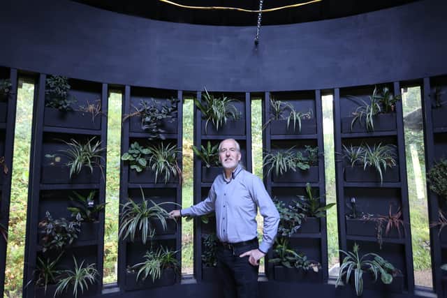 Hotel owner Steve Cuddy inside his cupcake-shaped wedding venue he built in his garden in Coleshill, Warwickshire.