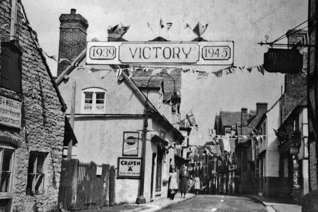 A 'Victory' banner was stretched across Much Wenlock High Street as the town celebrated Victory in Europe. According to Ina Taylor, author of the 2011 book Much Wenlock Past To Present, Holy Trinity Church and the guildhall were floodlit; sports and tea parties were held along with a thanksgiving service, and at night an effigy of Hitler was burned.