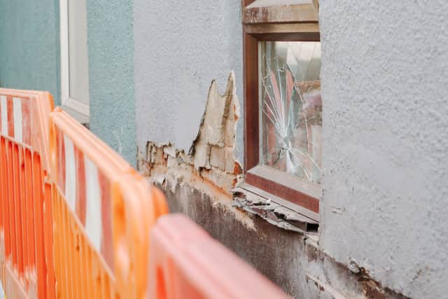 A house on Lower Galdeford that was struck by the HGV before it hit the community centre