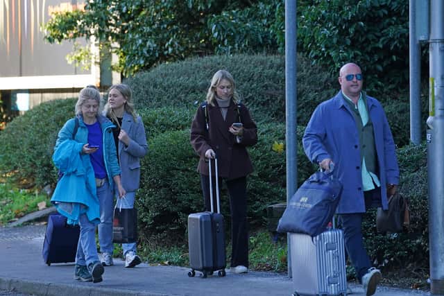 Passengers outside Gatwick Airport.