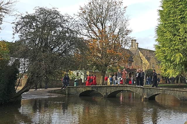 Villages like Bourton-on-the-Water draw tourists in their hordes