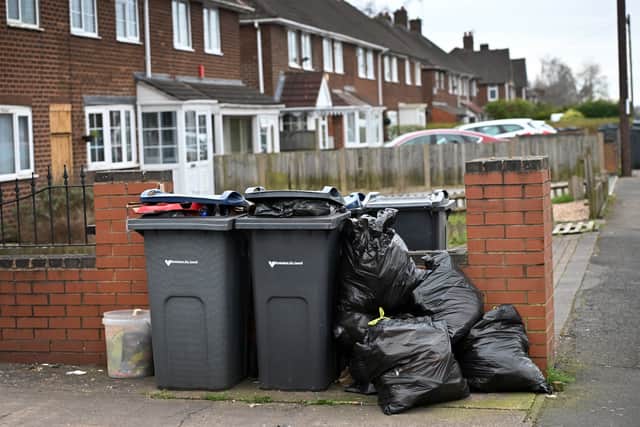 Bins have been overflowing across Birmingham for nearly two years
