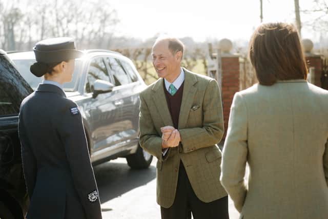 The Duke of Edinburgh, Prince Edward, visits Derwen College in Gobowen near Oswestry. Pictured with Millie Plum.