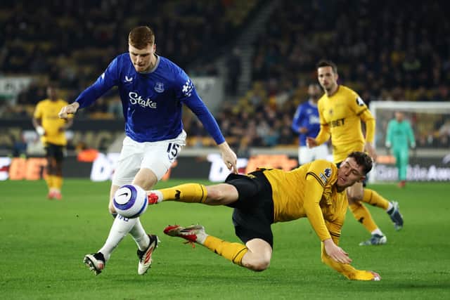 Jake O'Brien of Everton is challenged by Jorgen Strand Larsen (Photo by Dan Istitene/Getty Images)