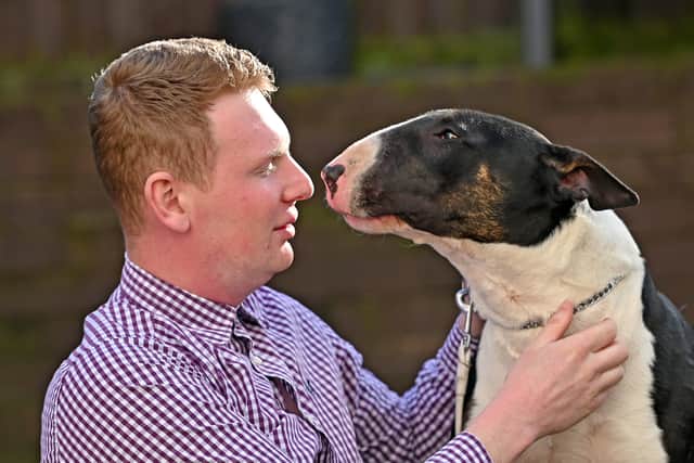 Horse-groomer Jack Mills from Dudley with English bull terrier, Murphy