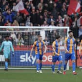 Dejected Shrewsbury Town players react after Demetri Mitchell of Exeter City scored a goal to make it 2-0 (AMA)