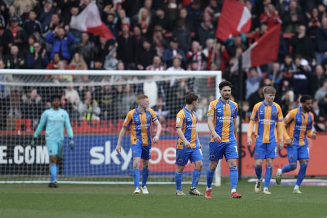 Dejected Shrewsbury Town players react after Demetri Mitchell of Exeter City scored a goal to make it 2-0 (AMA)