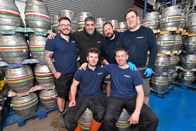 Head brewer Luke Edwards and lead brewer Ali Somers with the team.