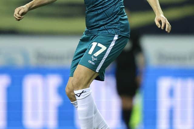 Alex Gilliead of Shrewsbury Town in action against Wigan in December (AMA)