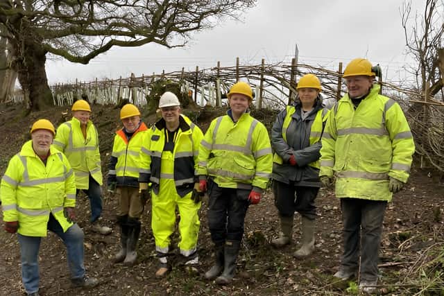 SUCS volunteers after hedge laying.