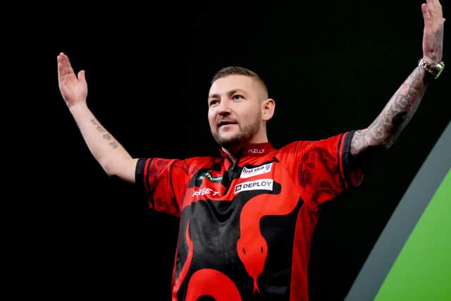 Nathan Aspinall coasted to a 4-0 win over Ricardo Pietreczko at the World Darts Championship (John Walton/PA)