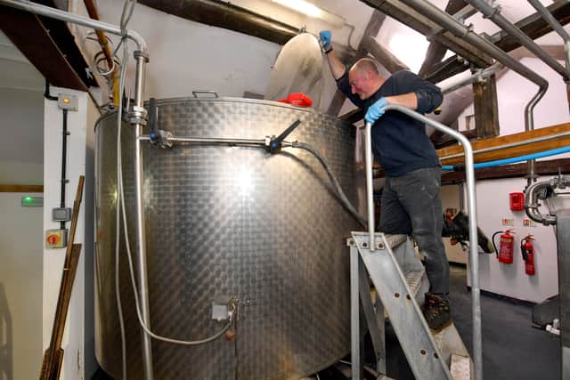 Brewer Neil Acocks keeps a close eye on the process