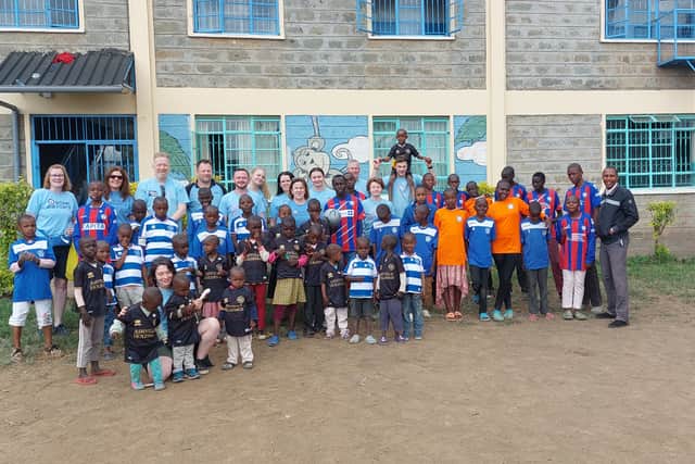 Nearly 8,500 football shirts were handed out.