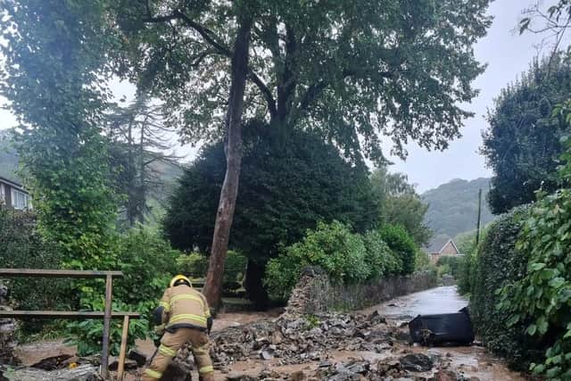 A wall collapsed in All Stretton in the floods in September. Photo: Shropshire Fire and Rescue Service