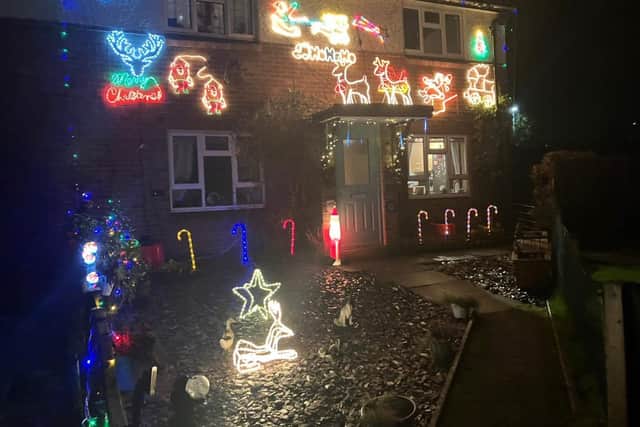 About ten houses have switched their amazing collections of lights and decorations on.