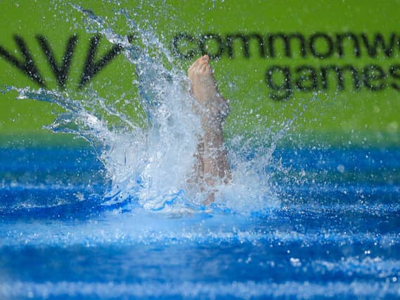 A diver enters the pool at the Birmingham 2022 Commonwealth Games. Former West Midlands Mayor Andy Street says delivering a successful games was one of his biggest achievements during his time in office