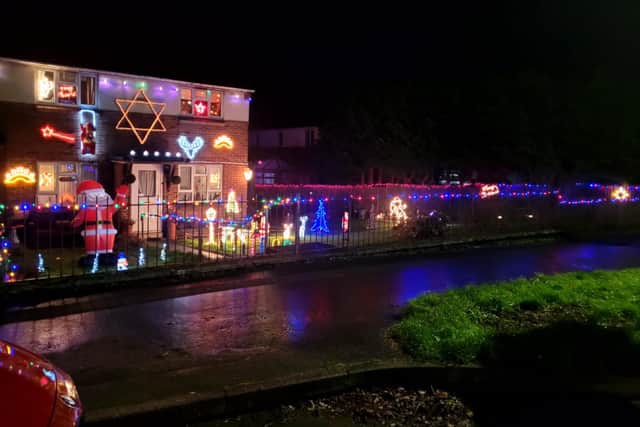 Residents on two Knighton housing estates have decorated the front of their houses for charity for the 11th year running.