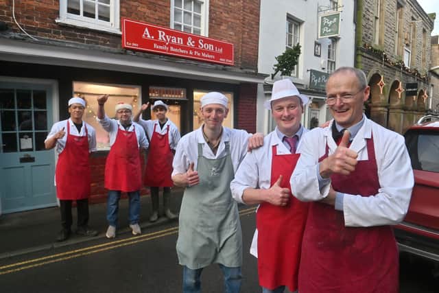 LAST COPYRIGHT NATIONAL WORLD STEVE LEATH 22/12/24We catch up with The Ryan Butchers team who also run the pie shop next door. Its been full on for them as some days there in just after midnight and were open at 6.30am this morning. People travel some distance for there pies and food. At the front is the family: Paddy Ryan then F-B: Mike Ryan and Sam Ryan, then some of the team at the back L-R: Elijah Beau-Campbell, Lee Willis and Knox Davis.