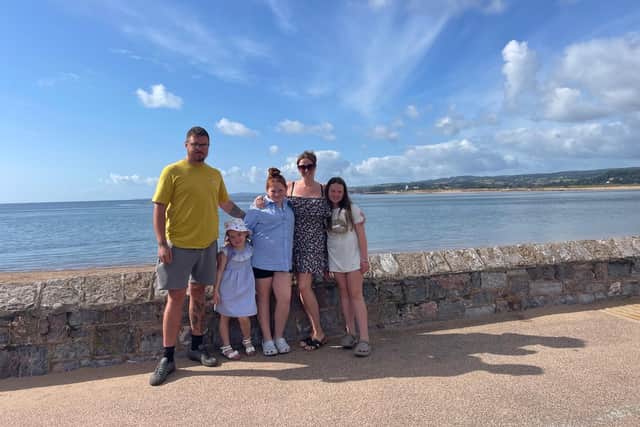 Hallie-Mae (second left) pictured with her family.
