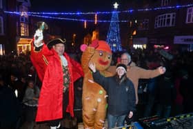Market Drayton's Christmas Lights were switched on by the town mayor, Councllor Roy Aldcroft, special guest Elspeth Taylor - the overall art winner in the Market Drayton calendar competition, the town crier, Geoff Russell, and the Gingerbread Man.