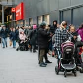 Shoppers queued waiting for the brand New British Heart Foundation Megastore to open.