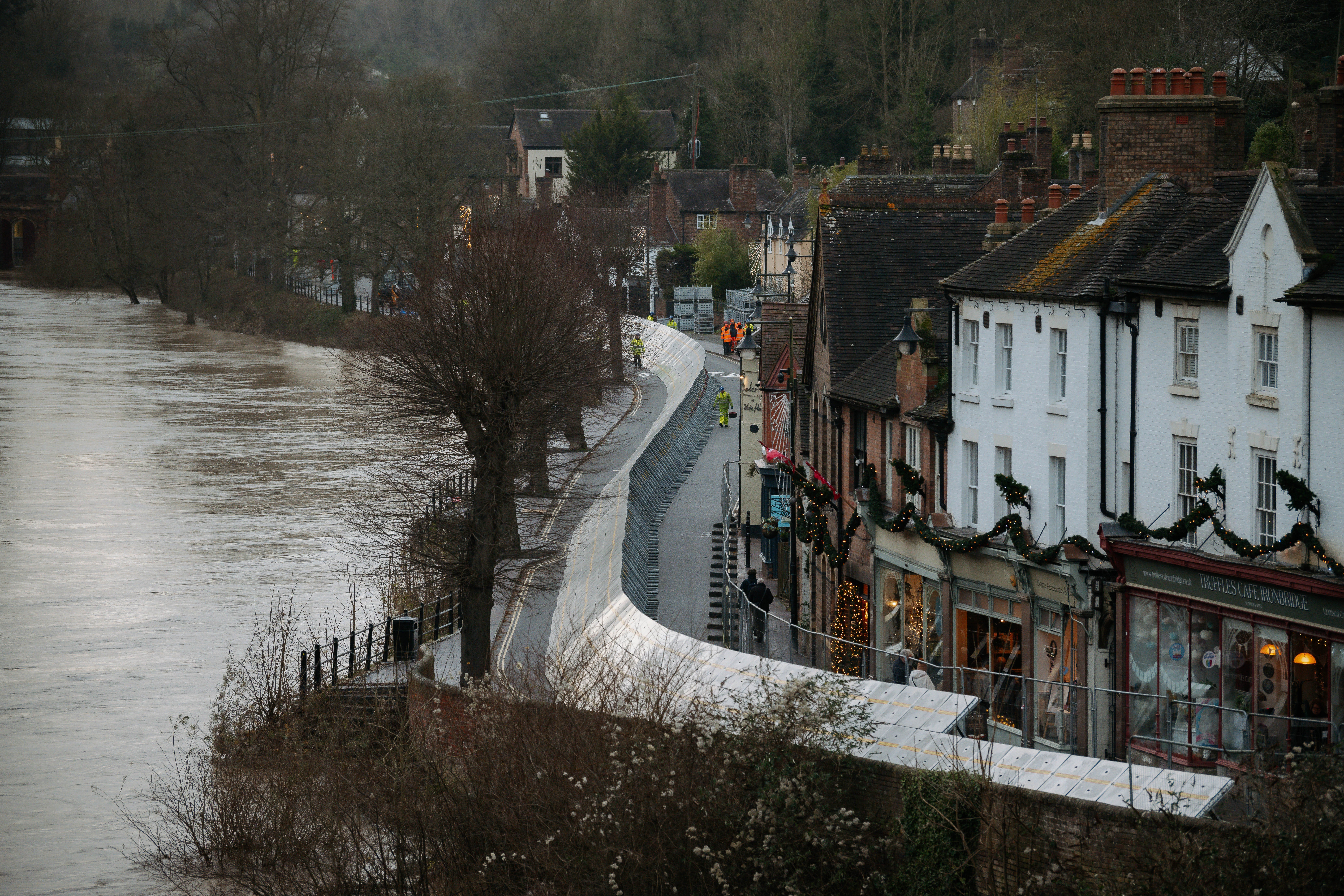 Storm Darragh: Flood barriers go up in Ironbridge as thousands remain ...