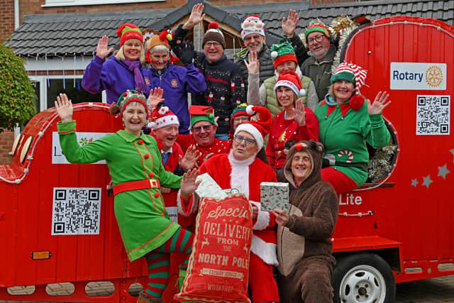 Newport Rotary Lite sleigh with Santa and elves getting ready to raise funds