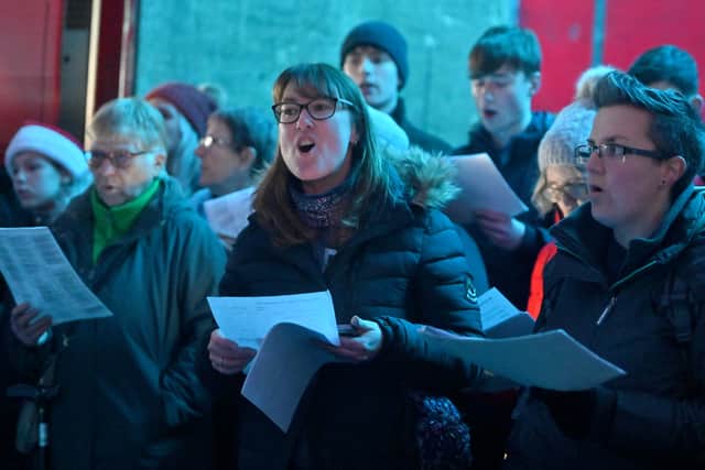 Carol singing at the Market Drayton Christmas lights switch-on.