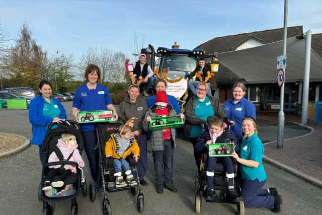 Josh and Tom with some children from Hope House Hospice