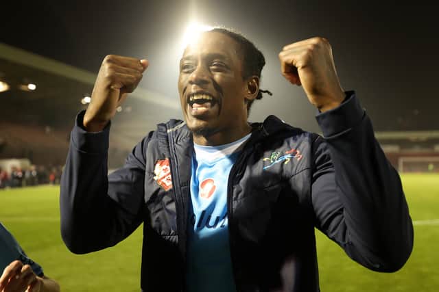 Kettering Town's Nile Ranger celebrates his side's shock FA Cup first-round victory at Northampton