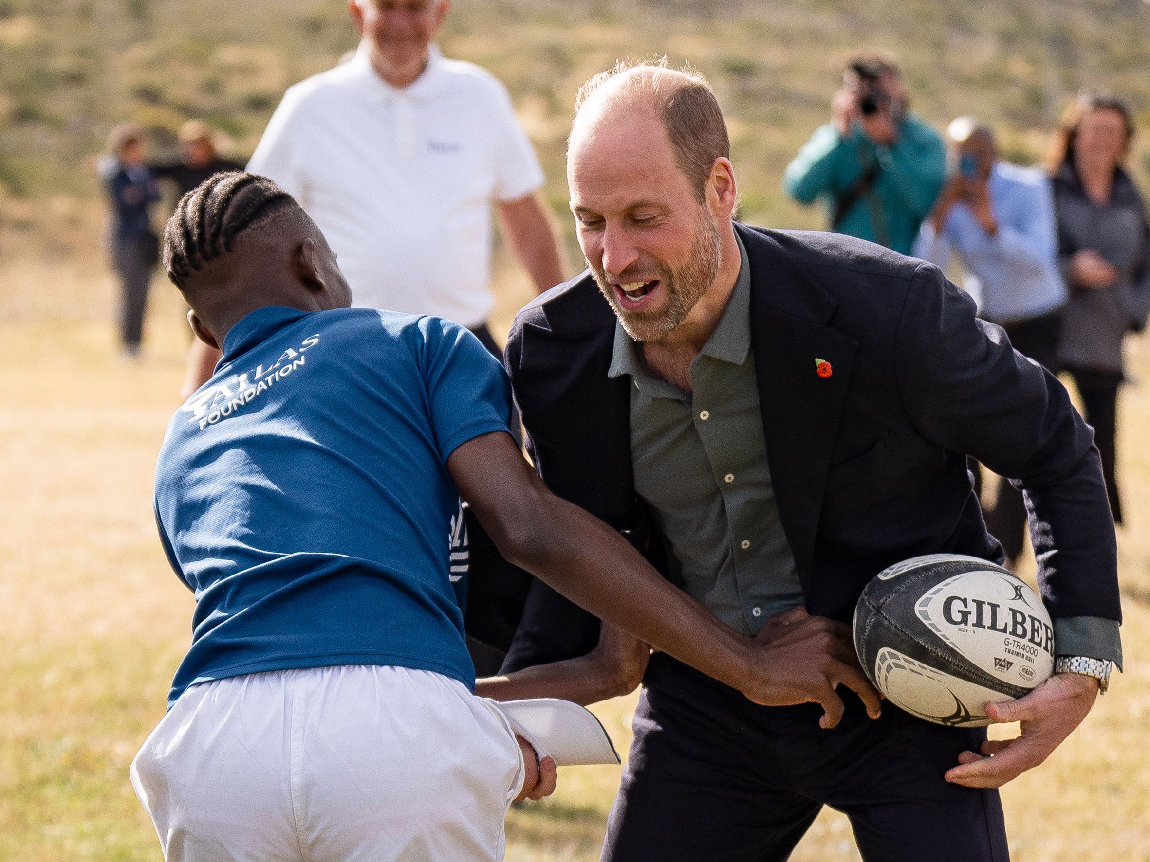 Teenagers shout ‘tackle the prince’ as William joins them for touch rugby