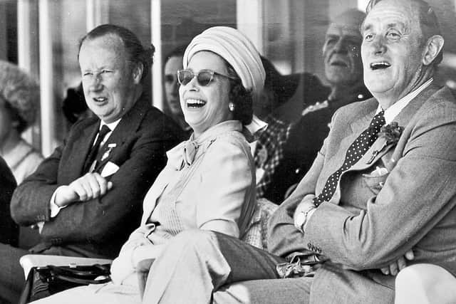The Queen came along to the West Mid Show at Shrewsbury in its centenary year of 1975 and was clearly happy to be there as she watched on from a stand