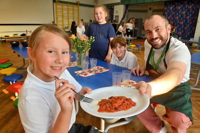 Preparing a Mexican feast at Coleham Primary School were Stephen Guy (aka The Hungry Guy), and pupils Maya Edwards, nine, Chloe Randall, eight, Henry Gardiner, nine