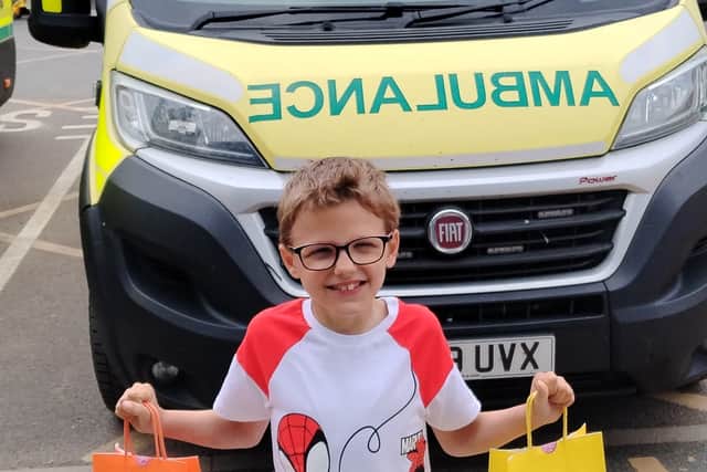 Finley-Jay with goodies for the ambulance staff.
