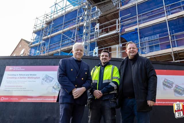 (Left to right) Graham Wynn, Chair of Telford Towns Fund Board, Tom Ford, Pave Aways Site Manager and Councillor Paul Davis, Ward Councillor for Haygate & Park, outside the former YMCA building at 1, Walker Street, Wellington.