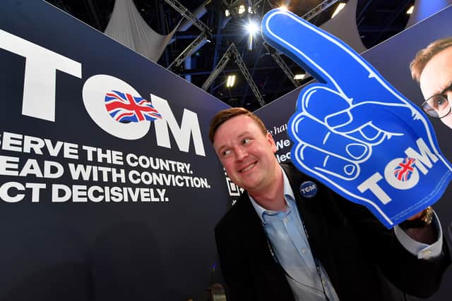 Sam Barrick models the Tom Tugendhat foam finger