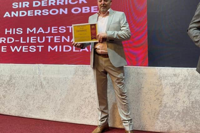 Paul Gallagher with the award at the presentation ceremony