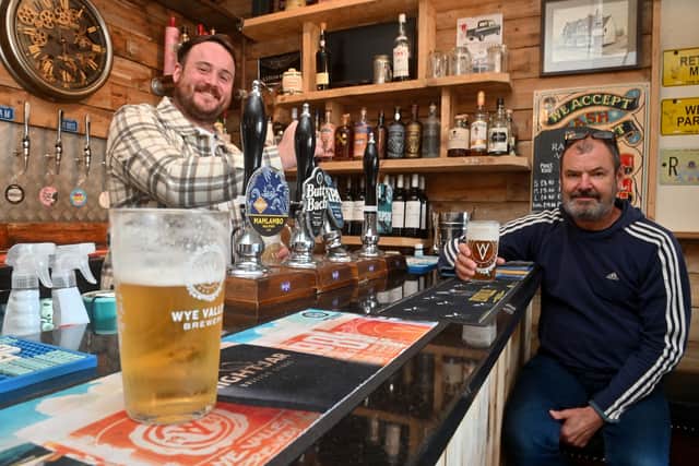 Martin Mountford enjoys a pint alongside Sam Nicholls
