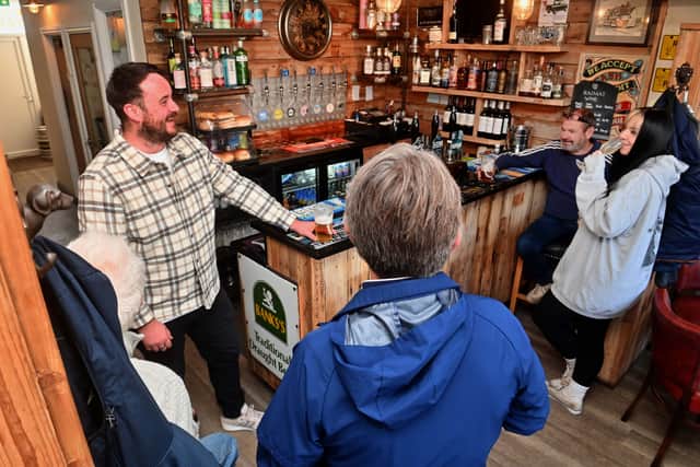 The pub has a communal feeling, with people coming in to join the conversation