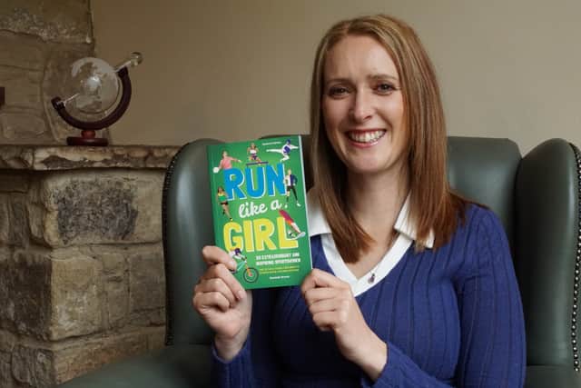 Danielle with her book 'Run Like a Girl'.