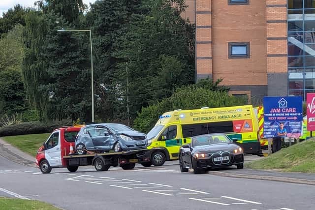 Car driver 'cut free' and taken to hospital after crash with lorry in ...