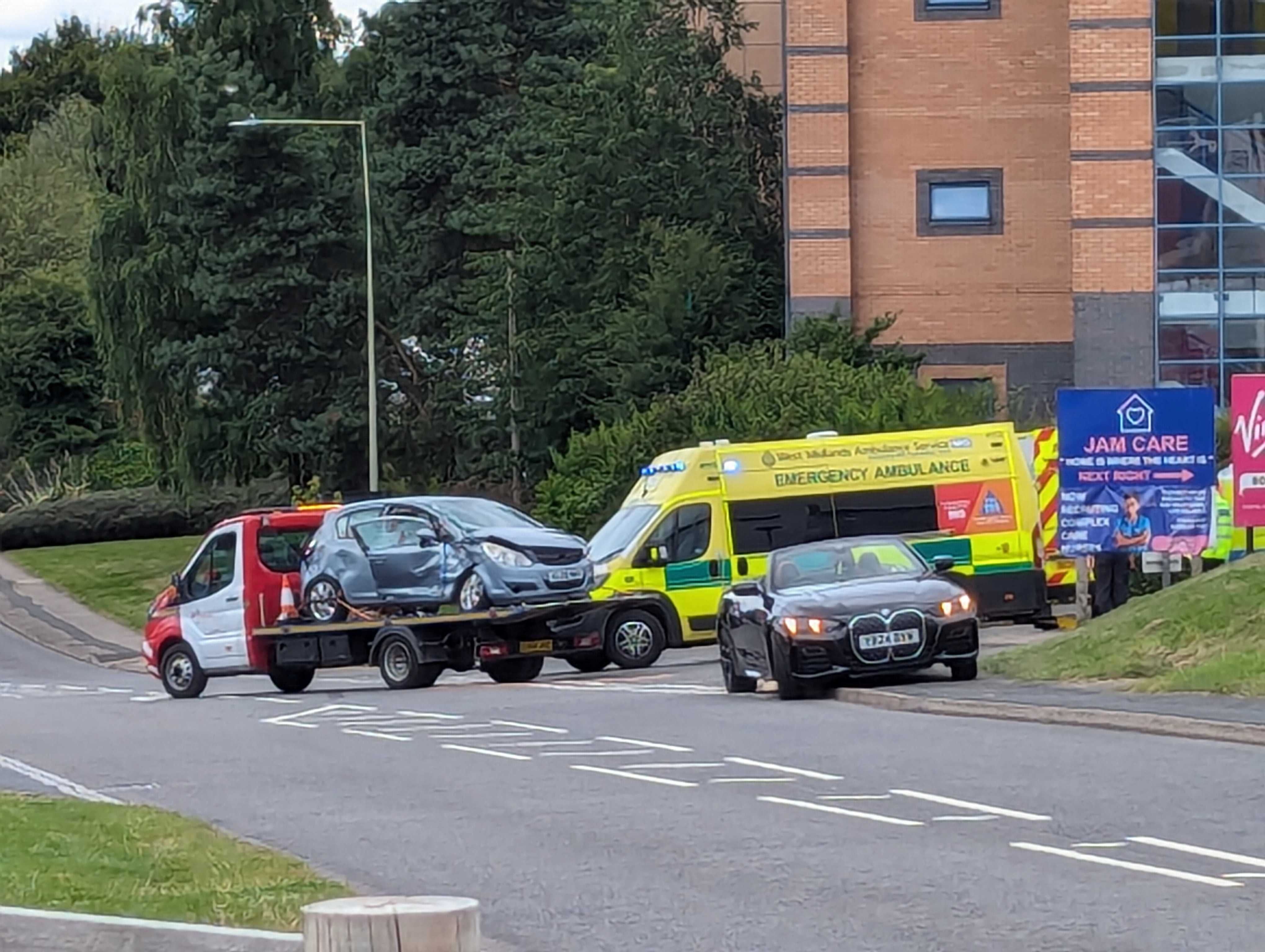 Car driver 'cut free' and taken to hospital after crash with lorry in ...