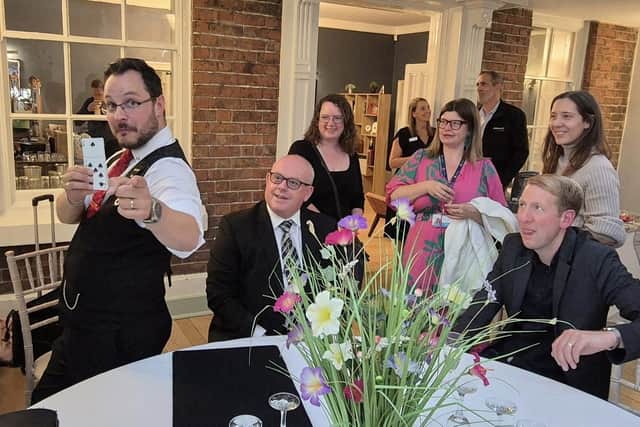 Magician Jack Dent entertained guests with sleight-of-hand routines