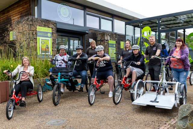 Councillor Carolyn Healy with council employees from Telford Bike Hub and residents as they test ride the new bikes. Picture: Telford & Wrekin Council