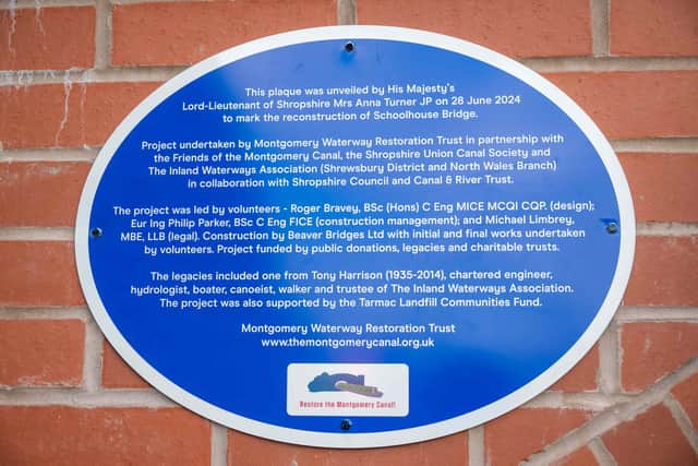 The plaque marking the new bridge.